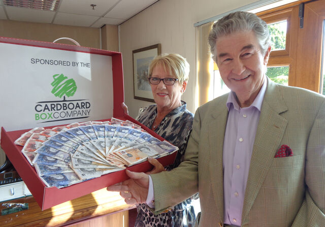 Summer raffle winner receives cash prize