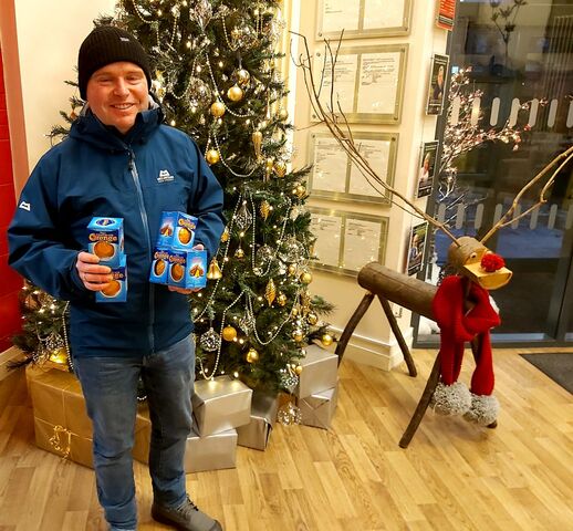 Chocolate Orange Man hands out Terry’s treats to hospice staff