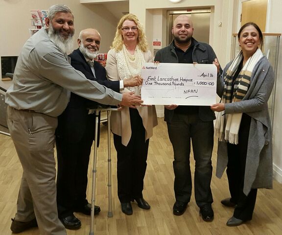 Newsagents make headlines with hospice donation