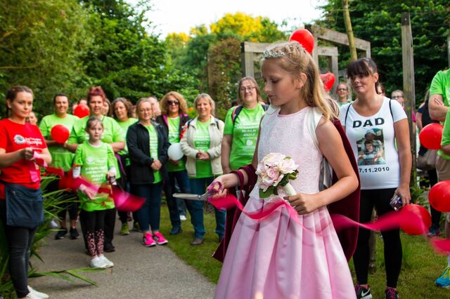 Rose Queen walks for Hospice