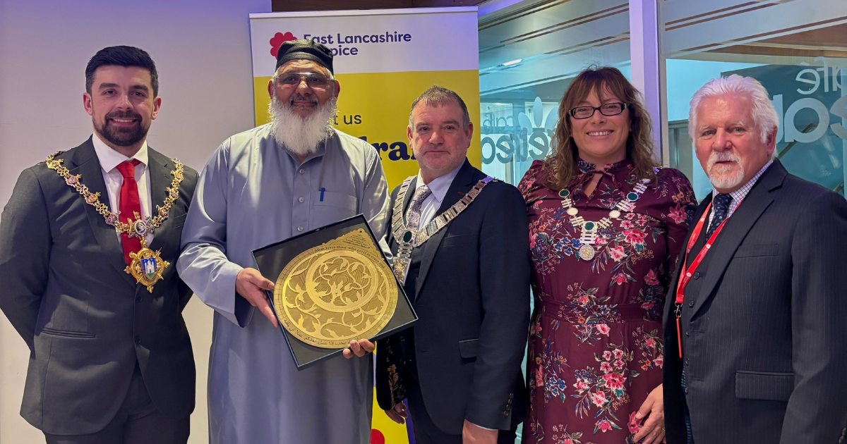 Suleman Khonat who has been volunteering for the Hospice, including our Ramadan appeal, with his award during our Iftar event.